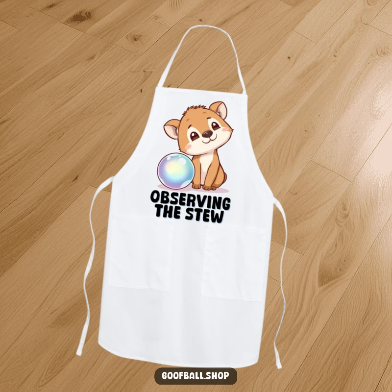 Funny Apron showing an animal tilting its head, captivated by a bouncing, iridescent ball, ready for anything with curious delight.